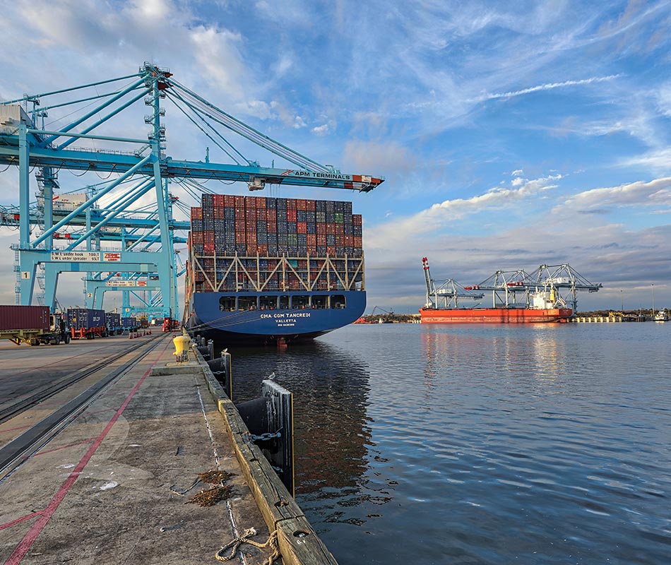 Barge with shipping containers at the Port of Mobile