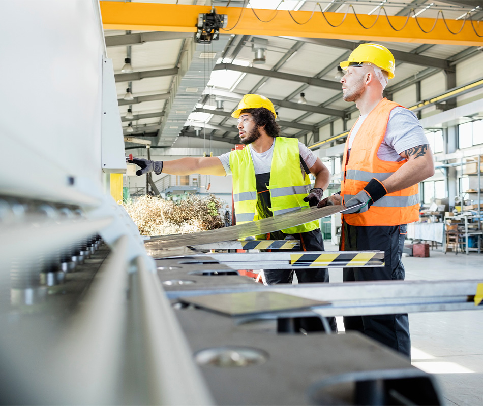 Two men on a production line