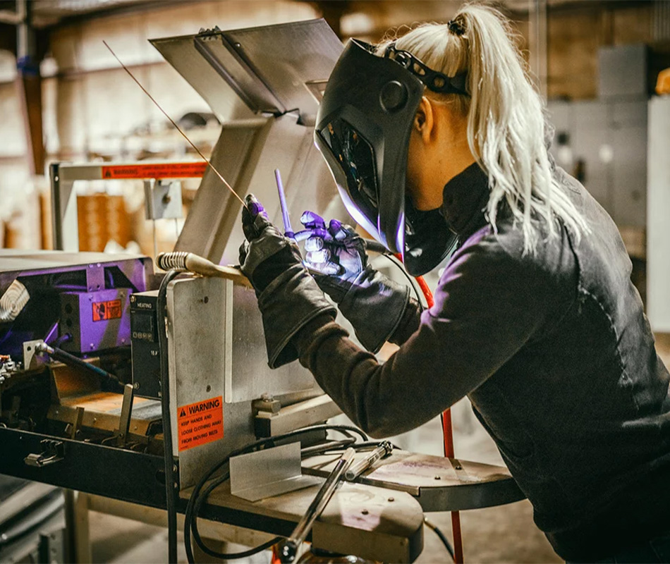 Woman welding